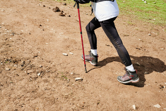 Blonde young woman trekking