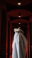 Naklejka premium Halloween Fabric Ghost with a Pumpkin