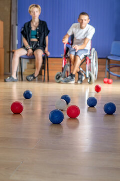 Anonymous Young disabled paralympic athlete with his trainer