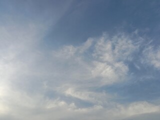 Grey clouds on blue sky in daytime. Cloud background. Presentation.