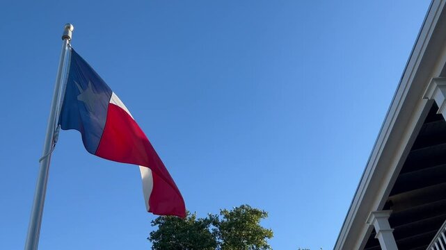 Texas flag waving in the wind 