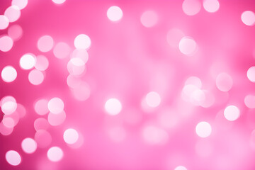 Abstract background of light bokeh blur On pink background.	