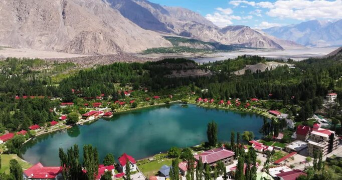 Breathtaking Aerial View of Shangrila Lake, known for Clear Waters. Mountainous and Forest Landscape