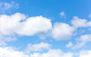 White clouds against a blue sky