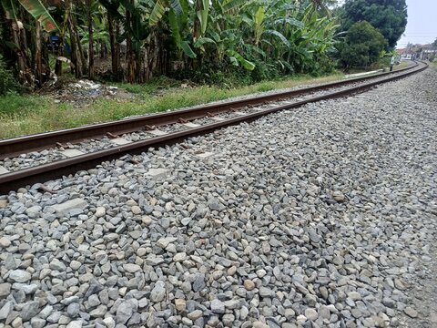 Broken stones to be placed on the sides of the railway tracks