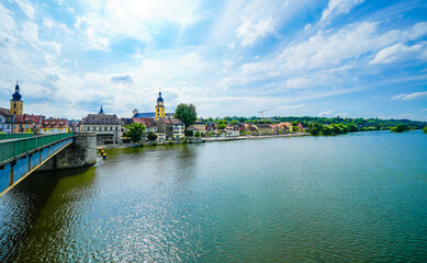 View from the Old Main Bridge of the Main and the city of Kitzingen. Medieval stone bridge of the city.