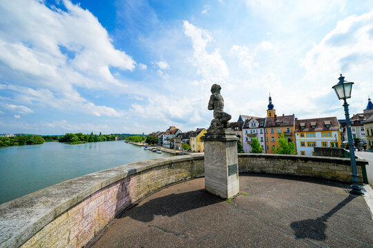 View from the Old Main Bridge of the Main and the city of Kitzingen. Medieval stone bridge of the city.