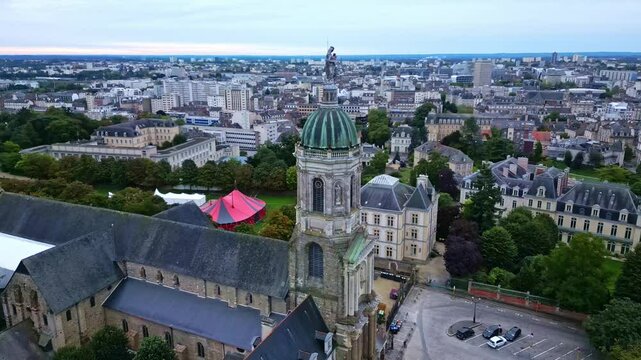 Panoramic view about the abbey church of Notre-Dame-en-Saint-Melaine with Thabor Park, Rennes, France.
