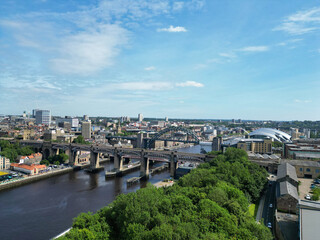Fototapeta premium Aerial View of Central Newcastle City from River Tyne at Northern England United Kingdom. July 19th, 2024, Drone's Camera Footage.