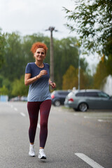 Woman running in park