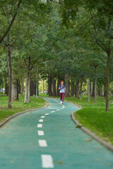 Woman running in park