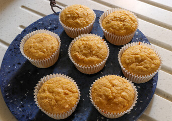 Cornbread muffins on a blue terrazzo serving plate