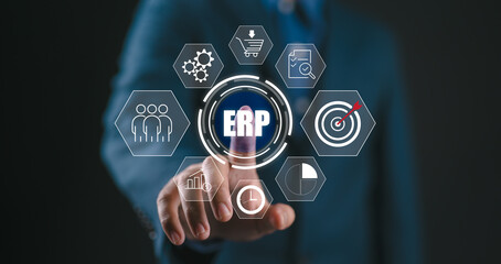Business people using a laptop with document management for ERP. Enterprise resource planning concept,Enterprise Resource Management ERP software system for business resources plan presented.