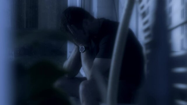 Mental illness or sleep deprivation concept, Man Having Panic Attack or Anxiety Crisis at night