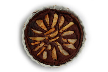 Top view of homemade Chocolate tart with sweet pear fruits in a bake pan isolated on white background