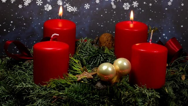 advent wreath with burning candles, ignting third candle