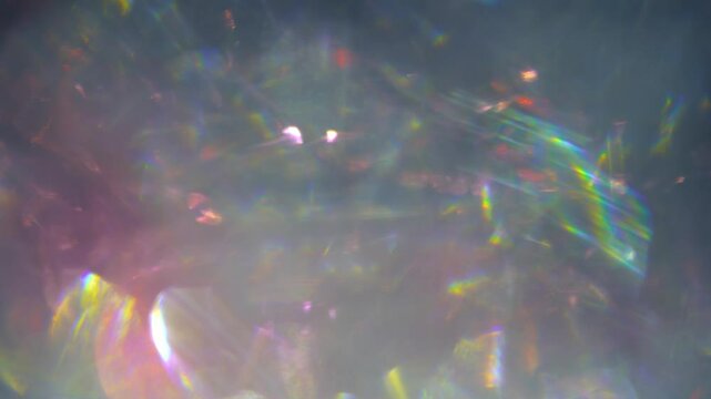 Blurred The refraction and reflection of light hitting the glass crystal surface. 