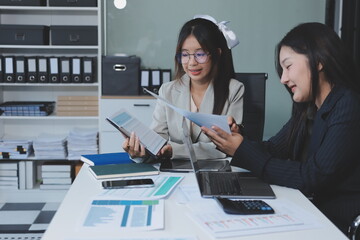 Team of business people are meeting to analyze data for marketing plan,Market research reports and income statistics, Financial and Accounting concept.