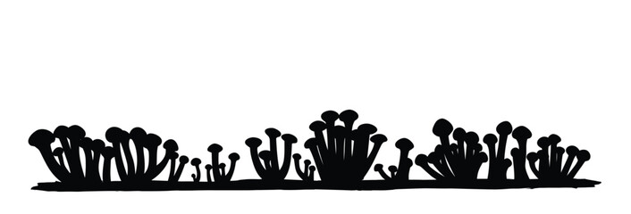 The silhouette of forest tree mushrooms.
