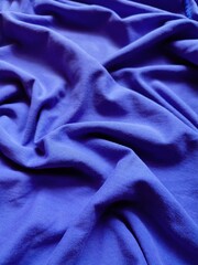 The texture and background of the fabric is blue