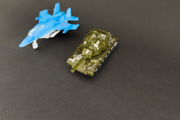 Toy fighter Plane and a toy tank