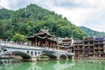 Obraz premium Miao Architecture by the Riverside in Fenghuang Ancient Town