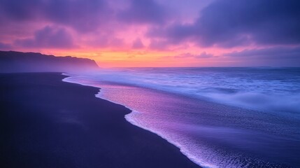 Fototapeta premium Black Sand Beach with Purple Sunset and Gentle Waves