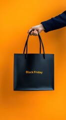 A hand holding a black shopping bag with the text "Black Friday" on an orange background, in a minimalistic style, Black Friday sale vibes