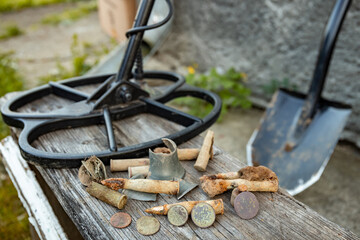 The result of searching for coins using a metal detector and a shovel.