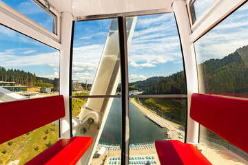 Ferris wheel, view from the cabin at a height with a beautiful view. © Bondariev Volodymyr.