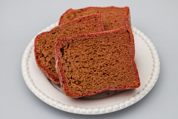 beet red bread on white small plate