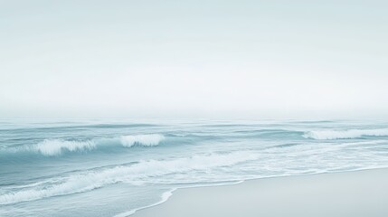 Waves crashing on a sandy beach.