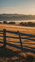 Obraz premium Picturesque Countryside with Rolling Hills and Wooden Fence
