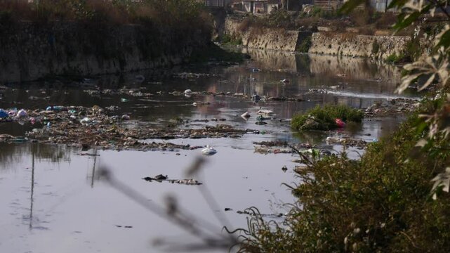  Plastic, garbage and drainage pollution affecting the river stream and surroundings.
