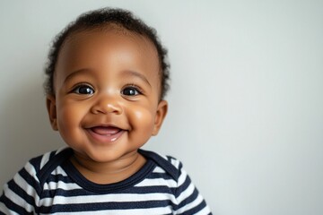 Smiling baby with striped shirt showing first teeth against white background Generative AI