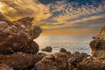The Granadella cove with crystal-clear waters in Javea, Alicante, in the Spanish Mediterranean