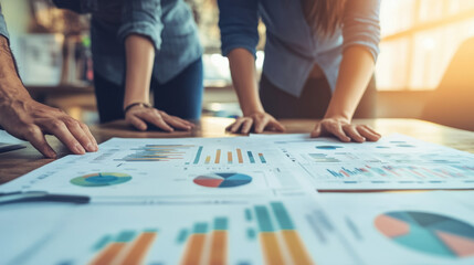 Collaborative Team Meeting: Analyzing Financial Reports to Drive Strategic Decisions for Business Growth and Performance Improvement