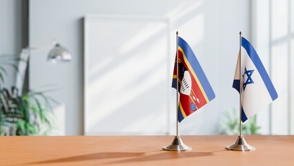 FLAGS OF ESWATINI AND ISRAEL ON TABLE