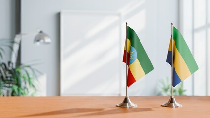 FLAGS OF ETHIOPIA AND GABON ON TABLE