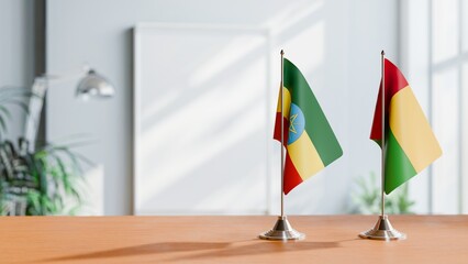 FLAGS OF ETHIOPIA AND GUINEA-BISSAU ON TABLE