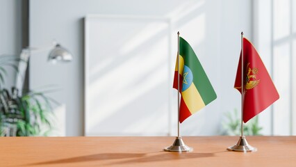 FLAGS OF ETHIOPIA AND MONTENEGRO ON TABLE