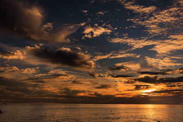 beautiful warm sunset on the sea coast