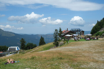 Aerial view of the Ceretto Laghi and Appenino Tosco Emiliano, houses, rifugio, cab lift, lakes, Emilia-Romagna, Italy