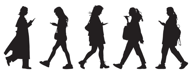 Silhouettes of walking women using phones on the go. Side view. 5 item set. Black and white vector illustration.