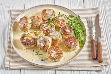 juicy chicken rissoles, cakes in rich cream sauce