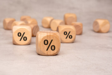 Wooden Blocks featuring Percentage Symbols used for Understanding Financial Concepts Effectively