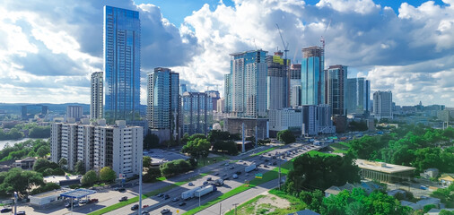 Obraz premium Panorama aerial view Interstate I-35 Monarch Highway busy traffic downtown Austin, Texas Capital City near Colorado River, skyscraper, high-rise office building in fast growing metropolitan area