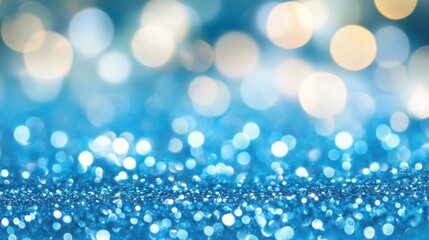 Fototapeta premium The enchanting blue glitter background features shimmering sparkles and soft bokeh lights, perfect for festive or artistic designs