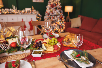Christmas dinner table setting at home