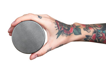 Tattooed hand holding face cream jar transparent png